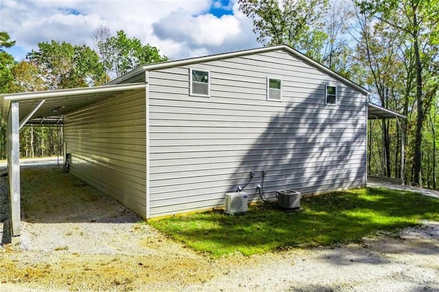 2125 Mccollum Church Rd, Lineville, AL 36266 - view of home's exterior with a carport and ac unit