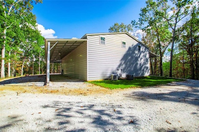 2125 Mccollum Church Rd, Lineville, AL 36266 - view of side of home with an attached carport