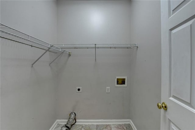 laundry room featuring hookup for a washing machine, laundry area, hookup for an electric dryer, and baseboards