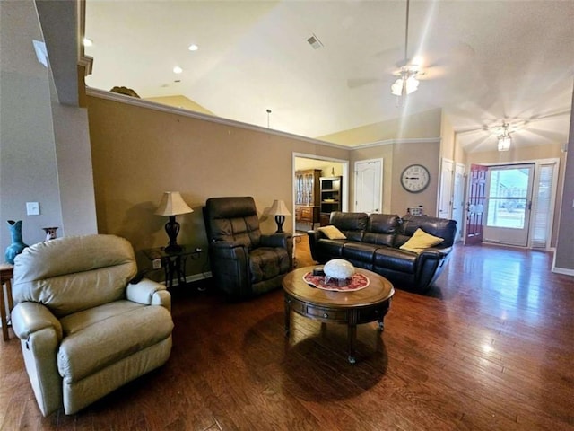 living room featuring dark wood-type flooring, ceiling fan, and vaulted ceiling