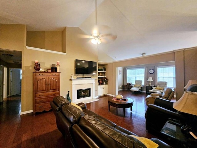 living room featuring dark hardwood / wood-style flooring, high vaulted ceiling, and ceiling fan