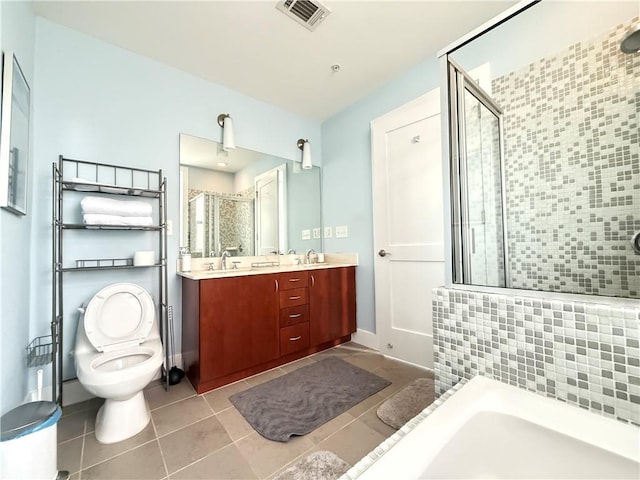 3655 Peachtree Rd NE Unit 304, Atlanta, GA 30319 - bathroom featuring a stall shower, double vanity, tile patterned floors, and a tub to relax in