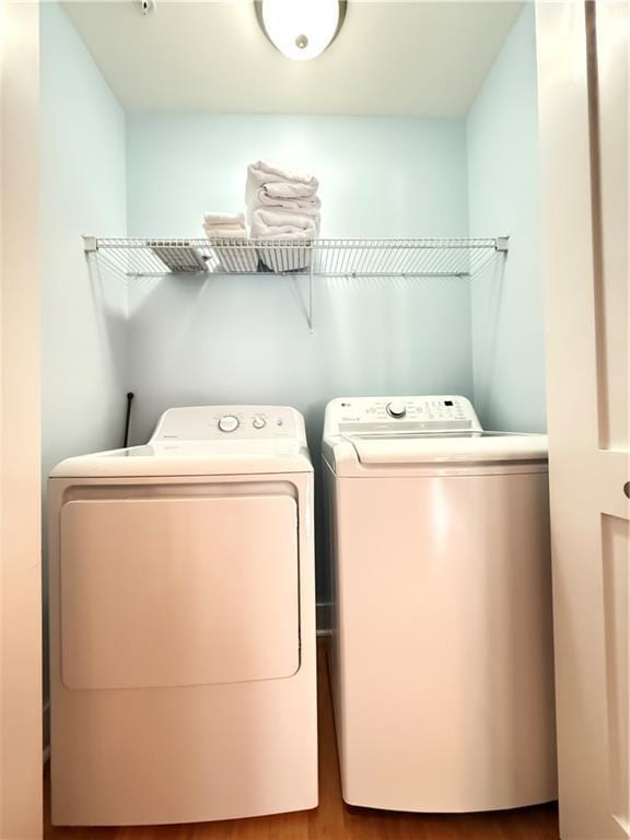 3655 Peachtree Rd NE Unit 304, Atlanta, GA 30319 - clothes washing area featuring washing machine and dryer