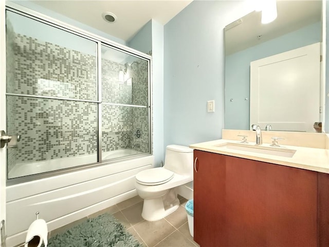 3655 Peachtree Rd NE Unit 304, Atlanta, GA 30319 - bathroom with tile patterned floors, toilet, enclosed tub / shower combo, and vanity