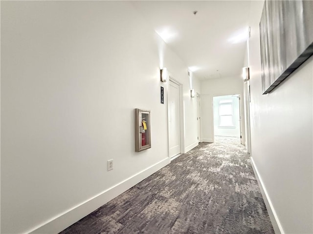 3655 Peachtree Rd NE Unit 304, Atlanta, GA 30319 - hallway with baseboards and carpet floors