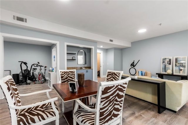 3655 Peachtree Rd NE Unit 304, Atlanta, GA 30319 - dining area featuring light wood-style floors and recessed lighting