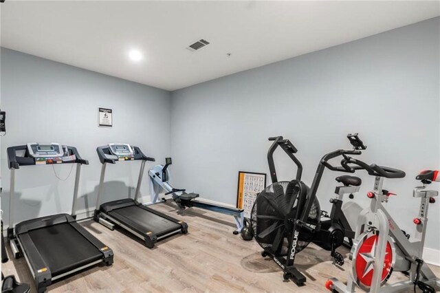 3655 Peachtree Rd NE Unit 304, Atlanta, GA 30319 - exercise room featuring light wood-style floors and baseboards