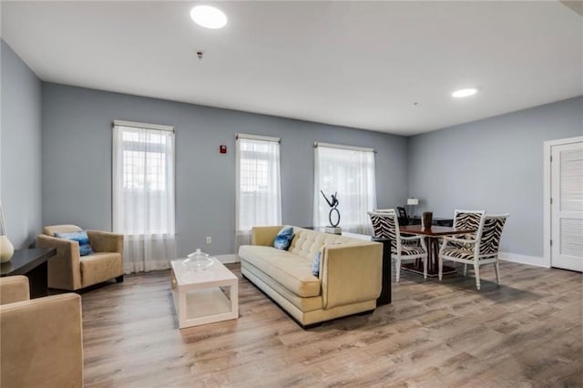 3655 Peachtree Rd NE Unit 304, Atlanta, GA 30319 - living room featuring light wood finished floors, recessed lighting, and baseboards