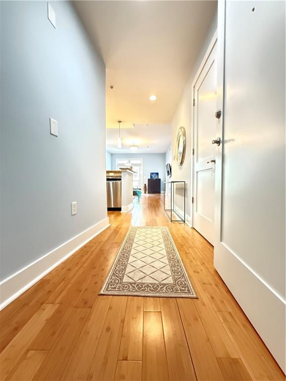 3655 Peachtree Rd NE Unit 304, Atlanta, GA 30319 - corridor featuring light wood-style flooring, baseboards, and recessed lighting