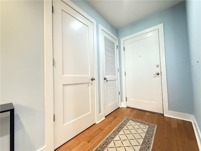 3655 Peachtree Rd NE Unit 304, Atlanta, GA 30319 - doorway with light wood-style flooring and baseboards