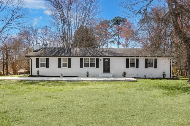 single story home featuring crawl space, a chimney, and a front lawn