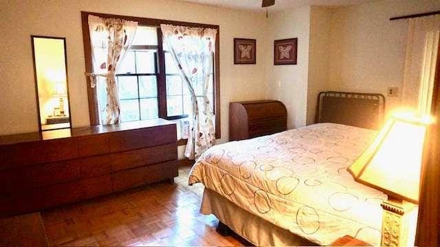 bedroom with parquet floors