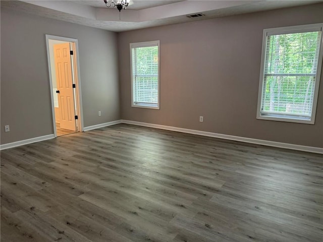 7454 Woody Springs Dr, Flowery Branch, GA 30542 - empty room featuring baseboards and wood finished floors
