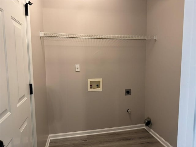 7454 Woody Springs Dr, Flowery Branch, GA 30542 - laundry area featuring electric dryer hookup, wood finished floors, hookup for a washing machine, and baseboards