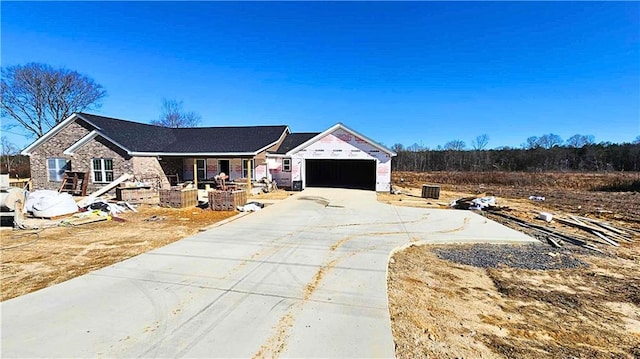 property in mid-construction with a garage