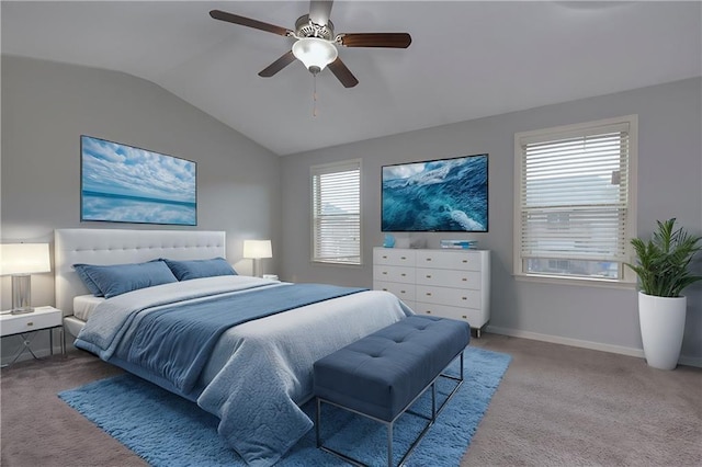 carpeted bedroom with ceiling fan, baseboards, and vaulted ceiling