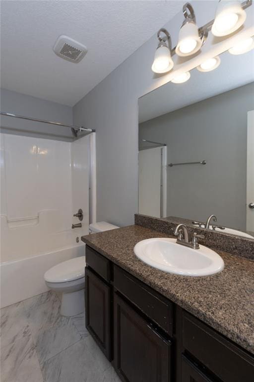 bathroom featuring visible vents, toilet, shower / bathing tub combination, marble finish floor, and vanity