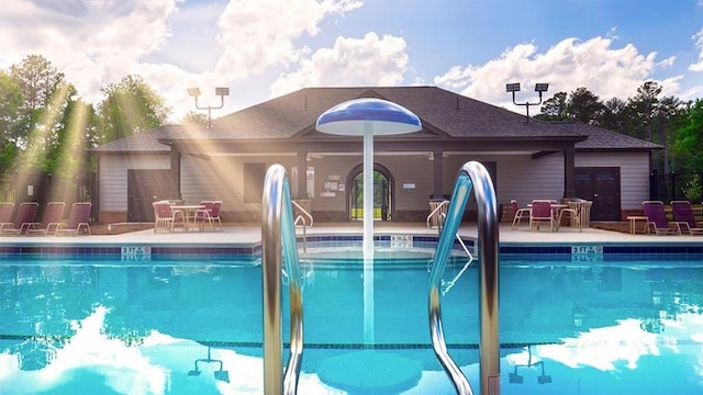 pool with a patio area