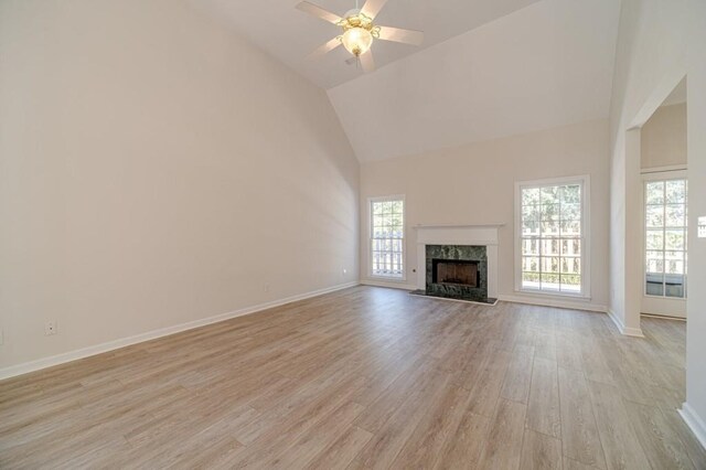 kitchen featuring light hardwood / wood-style floors, white cabinets, and appliances with stainless steel finishes