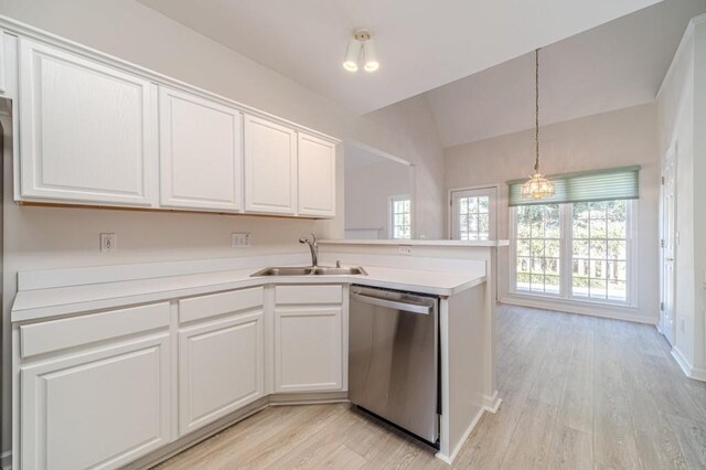 kitchen featuring white cabinetry, appliances with stainless steel finishes, and light wood-type flooring