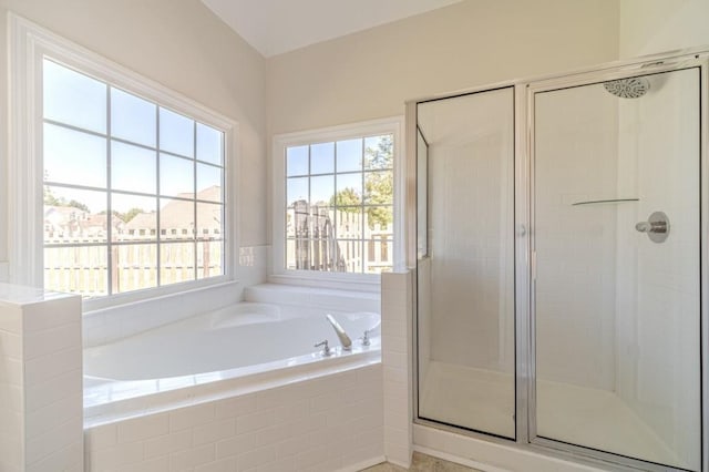 bathroom featuring a shower with shower door