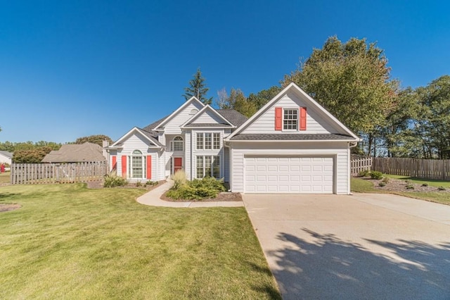 view of front facade featuring a garage and a front yard