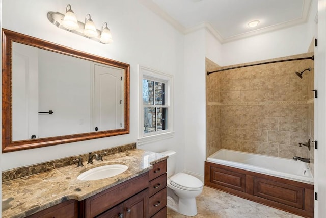 full bathroom featuring vanity, tiled shower / bath combo, toilet, and crown molding