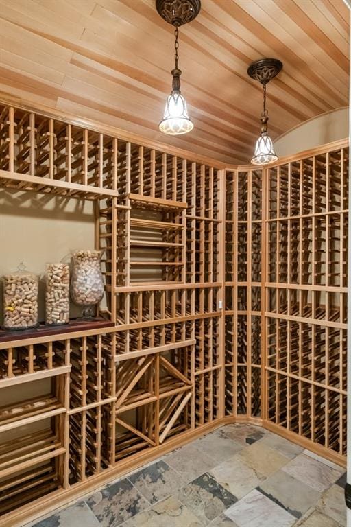 wine cellar featuring wooden ceiling