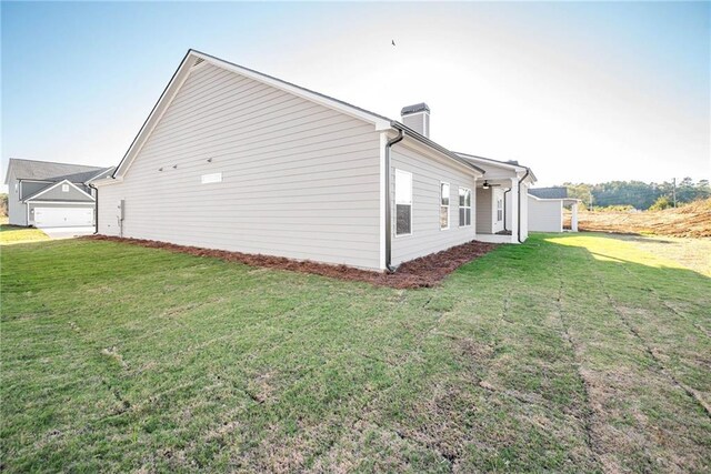 106 Harmony Farms Orch, Eatonton, GA 31024 - view of side of home featuring a yard