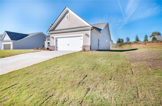106 Harmony Farms Orch, Eatonton, GA 31024 - view of front of property featuring a garage and a front yard