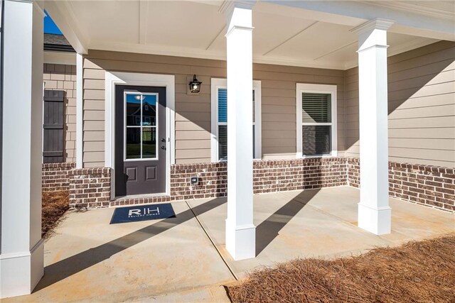 106 Harmony Farms Orch, Eatonton, GA 31024 - doorway to property with a porch