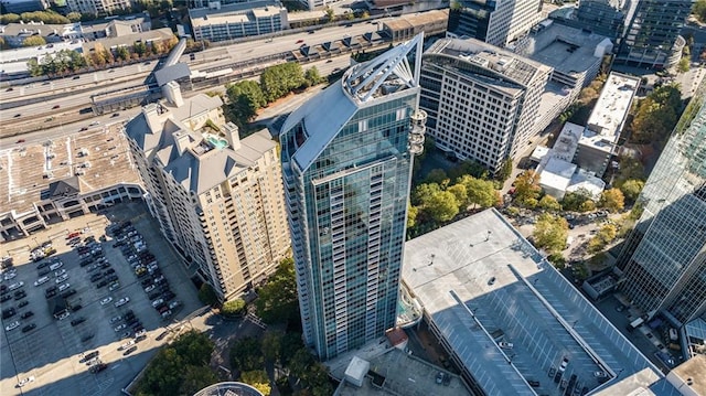 birds eye view of property featuring a city view