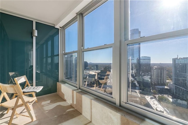 sunroom / solarium with a city view