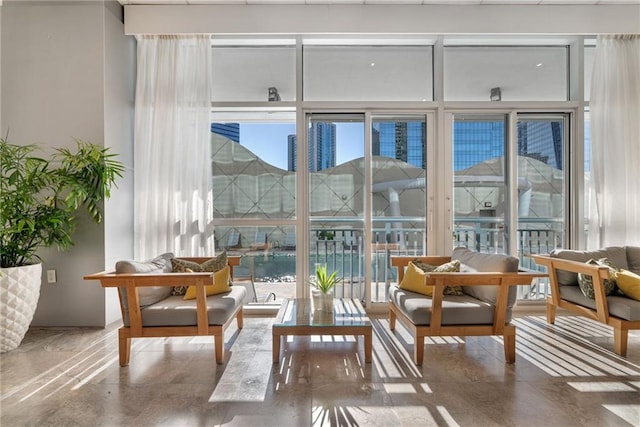 sunroom / solarium featuring plenty of natural light
