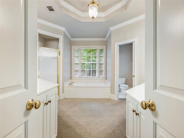 full bathroom with visible vents, ornamental molding, toilet, vanity, and a stall shower