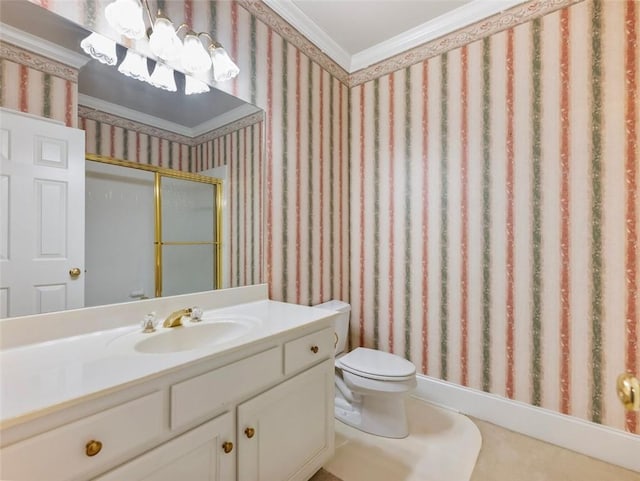 full bathroom featuring a shower stall, vanity, ornamental molding, and toilet