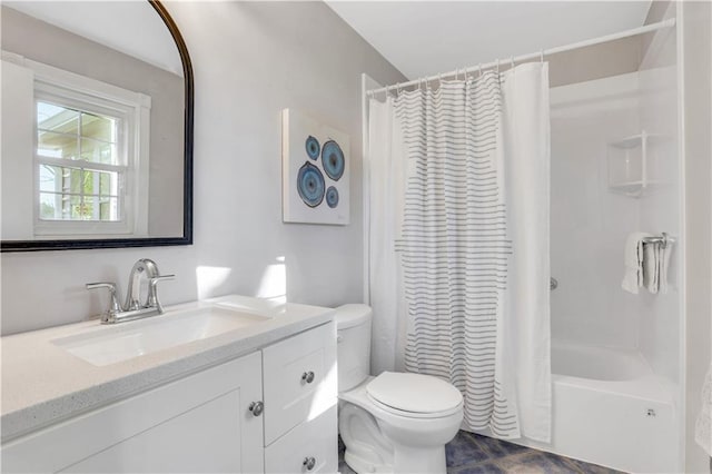 bathroom featuring vanity, toilet, and shower / bathtub combination with curtain