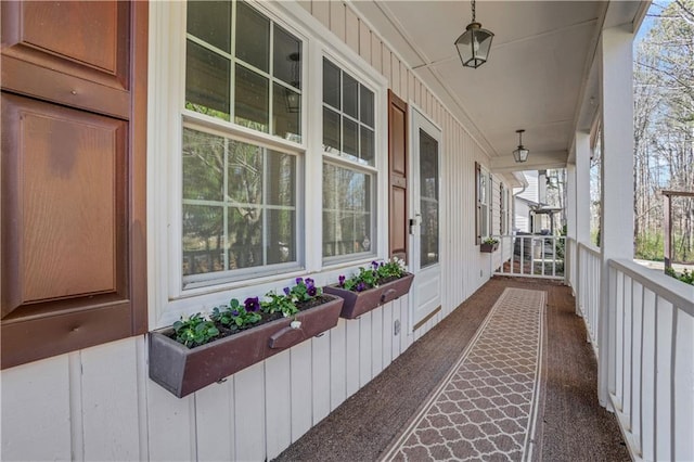 exterior space featuring a porch and a sunroom