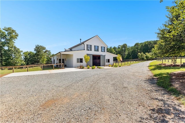 modern farmhouse style home with a carport