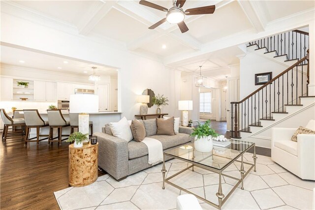 kitchen featuring appliances with stainless steel finishes, light countertops, and white cabinetry