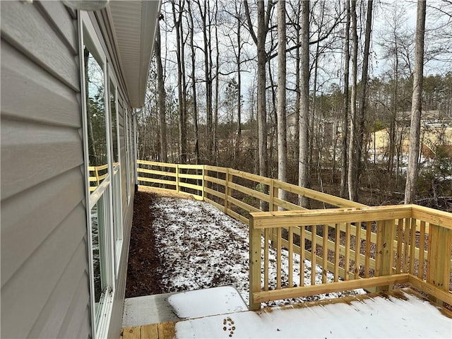 view of snow covered deck