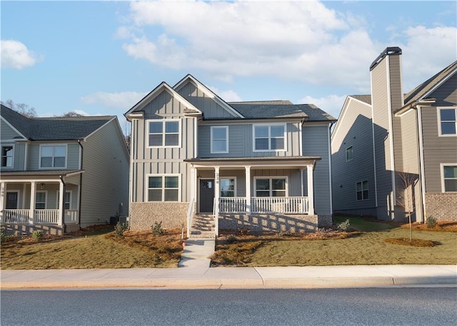 view of front of house featuring covered porch and central air condition unit