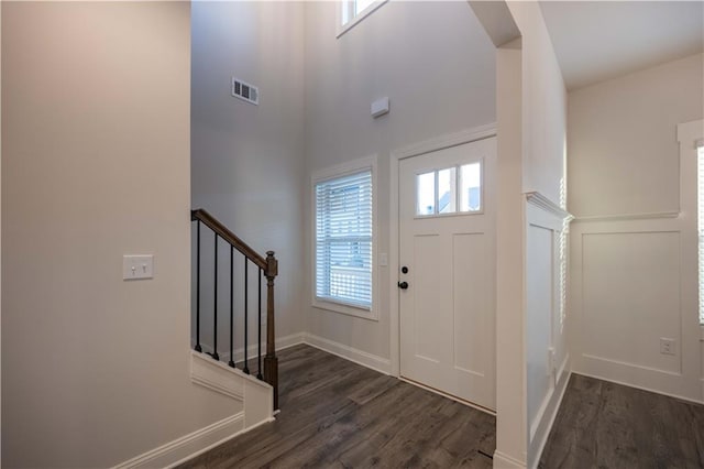 foyer with dark wood-type flooring