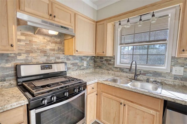 kitchen featuring backsplash, appliances with stainless steel finishes, light brown cabinets, a sink, and under cabinet range hood