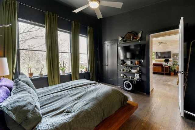 124 Nichols Branch Ln, Clayton, GA 30525 - bedroom with wood finished floors and ceiling fan