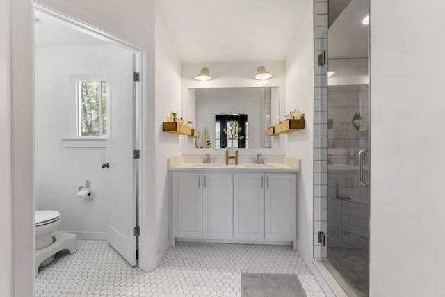 124 Nichols Branch Ln, Clayton, GA 30525 - full bath with a shower stall, double vanity, toilet, and baseboards