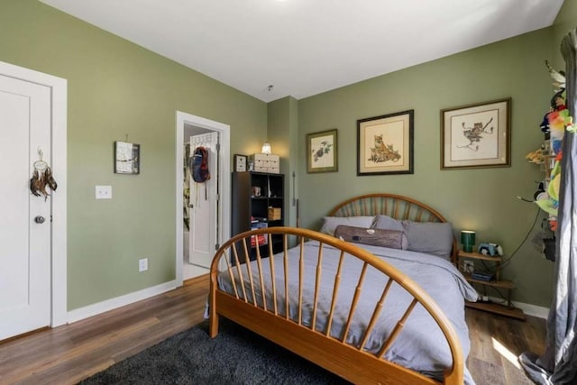 124 Nichols Branch Ln, Clayton, GA 30525 - bedroom featuring wood finished floors and baseboards