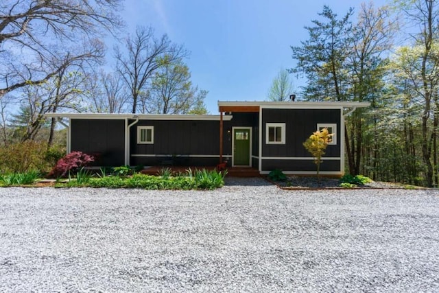 124 Nichols Branch Ln, Clayton, GA 30525 - view of front of house featuring board and batten siding and a sunroom