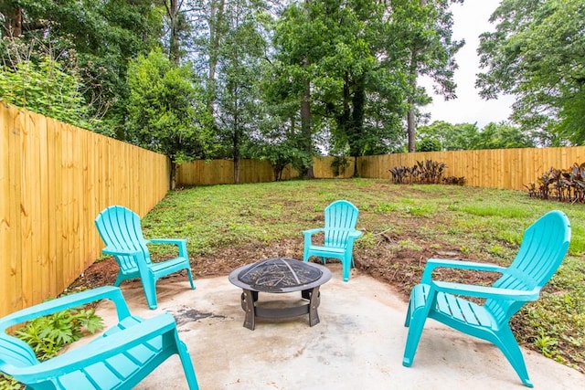 exterior space featuring an outdoor fire pit