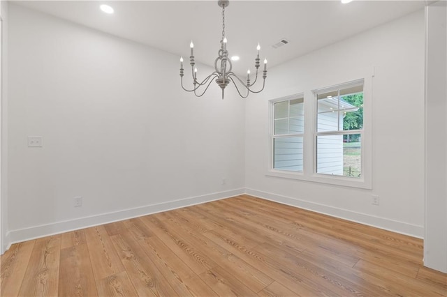 102-A S Cay Dr, Milledgeville, GA 31061 - unfurnished room with a chandelier, recessed lighting, light wood-type flooring, and baseboards